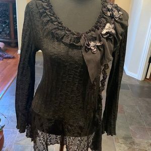 Fabulous black lace top by Zia with long sleeves and flowers and chiffon trim.